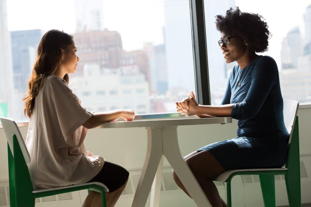 Two people discussing a topic. Discussing diabetes awareness is personal but important