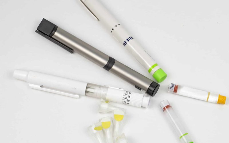 759366 - different types of pens for insulin administration.also two types of insulin flask and needles.