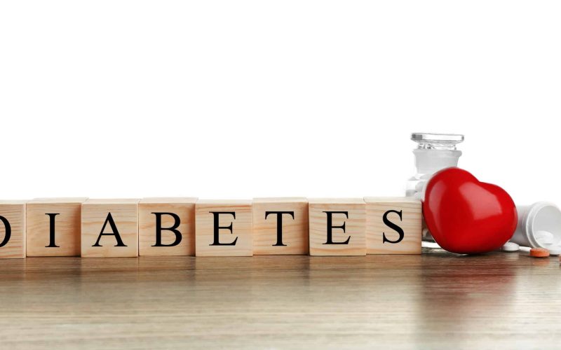 Wooden cubes with word Diabetes on table