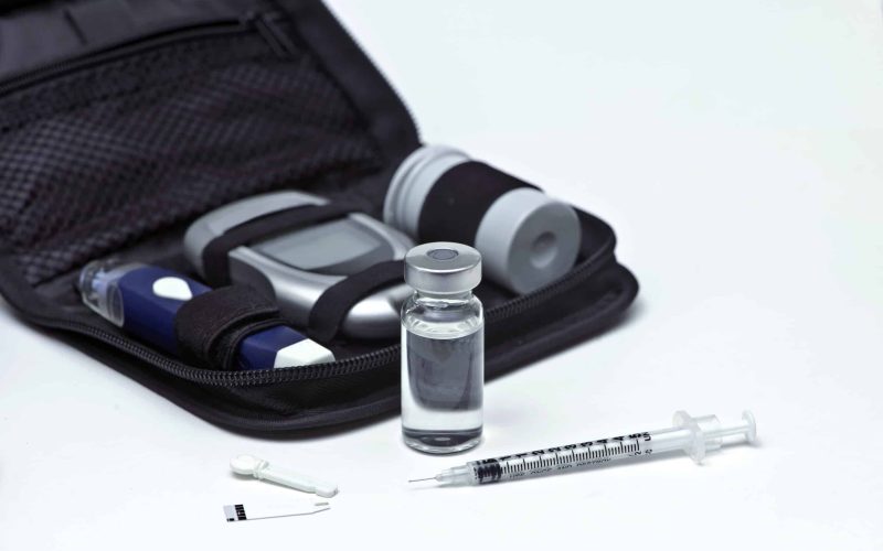 Insulin vial, syringe, lancet, strip and diabetic travel kit case.